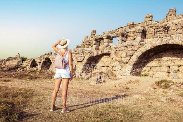 adult woman traveler hat looking amazing ruins old town ancient side turkey historical tourism concept 106035 1473