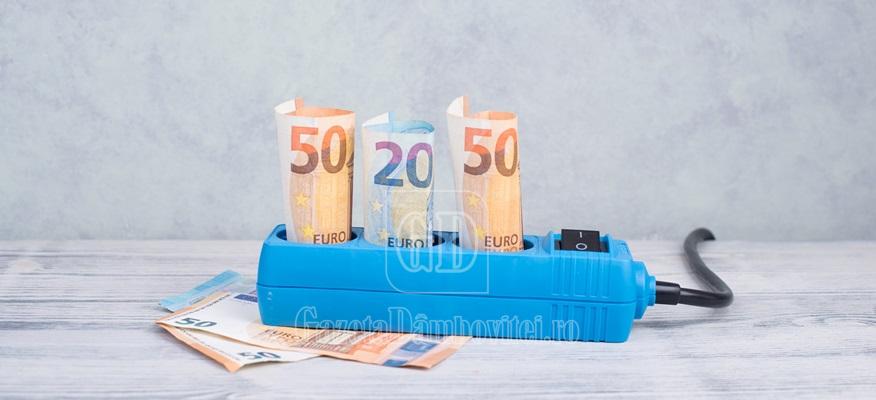 euro banknotes in a power outlet, rising prices, expensive green electricity