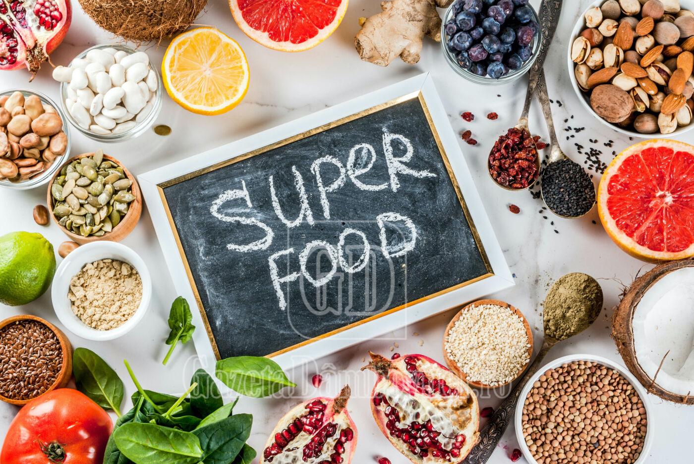 set of organic healthy diet food, superfoods beans, legumes, nuts, seeds, greens, fruit and vegetables.. white background copy space. top view frame