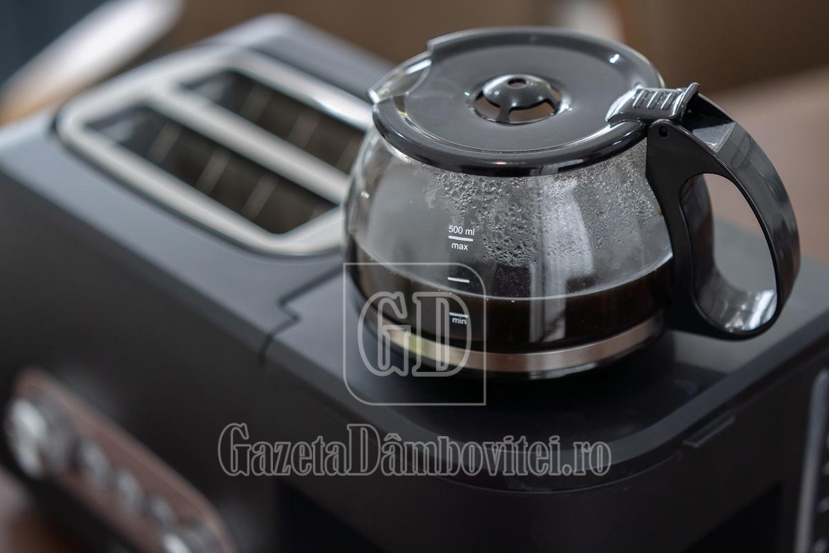 black plastic and glass automatic espresso machine or coffeemake