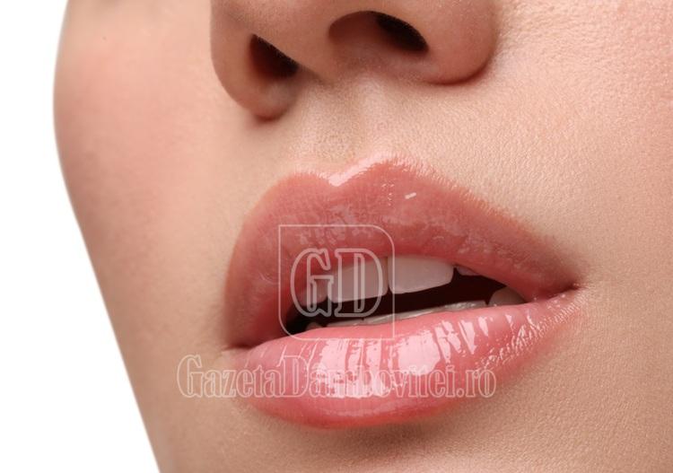 woman,wearing,beautiful,lip,gloss,on,white,background,,closeup