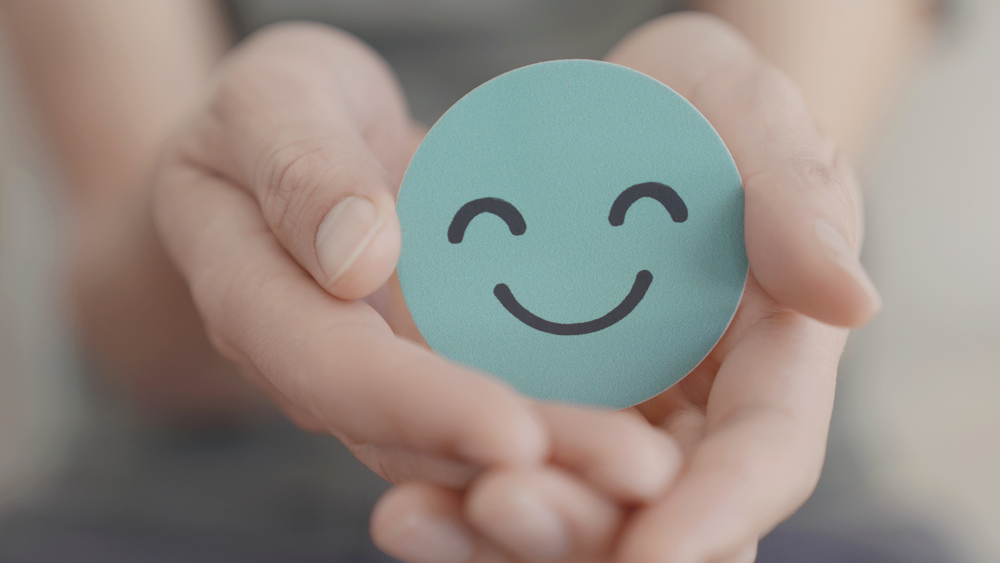 hands,holding,green,happy,smile,face,,good,feedback,rating,and